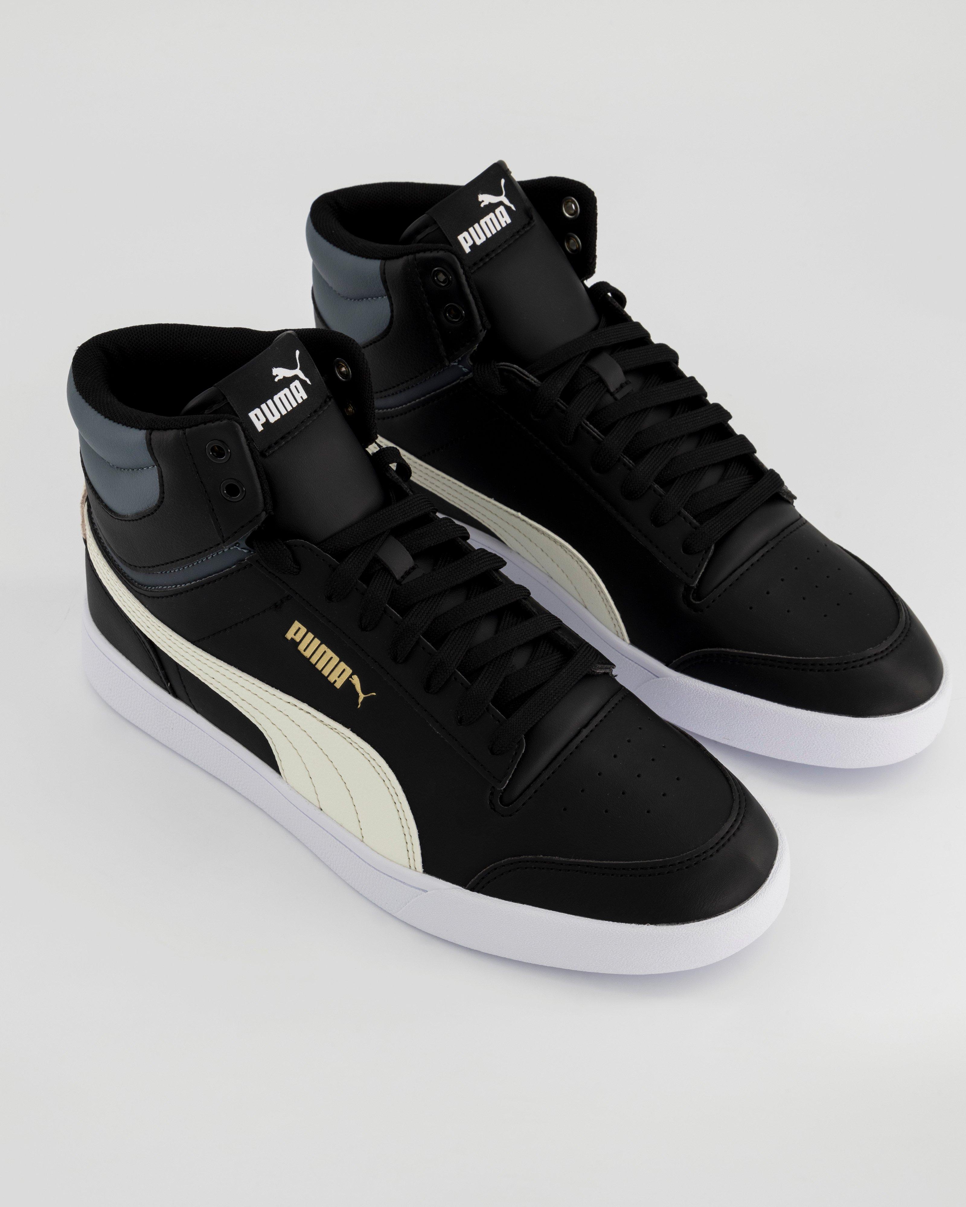 High top clearance pumas with strap