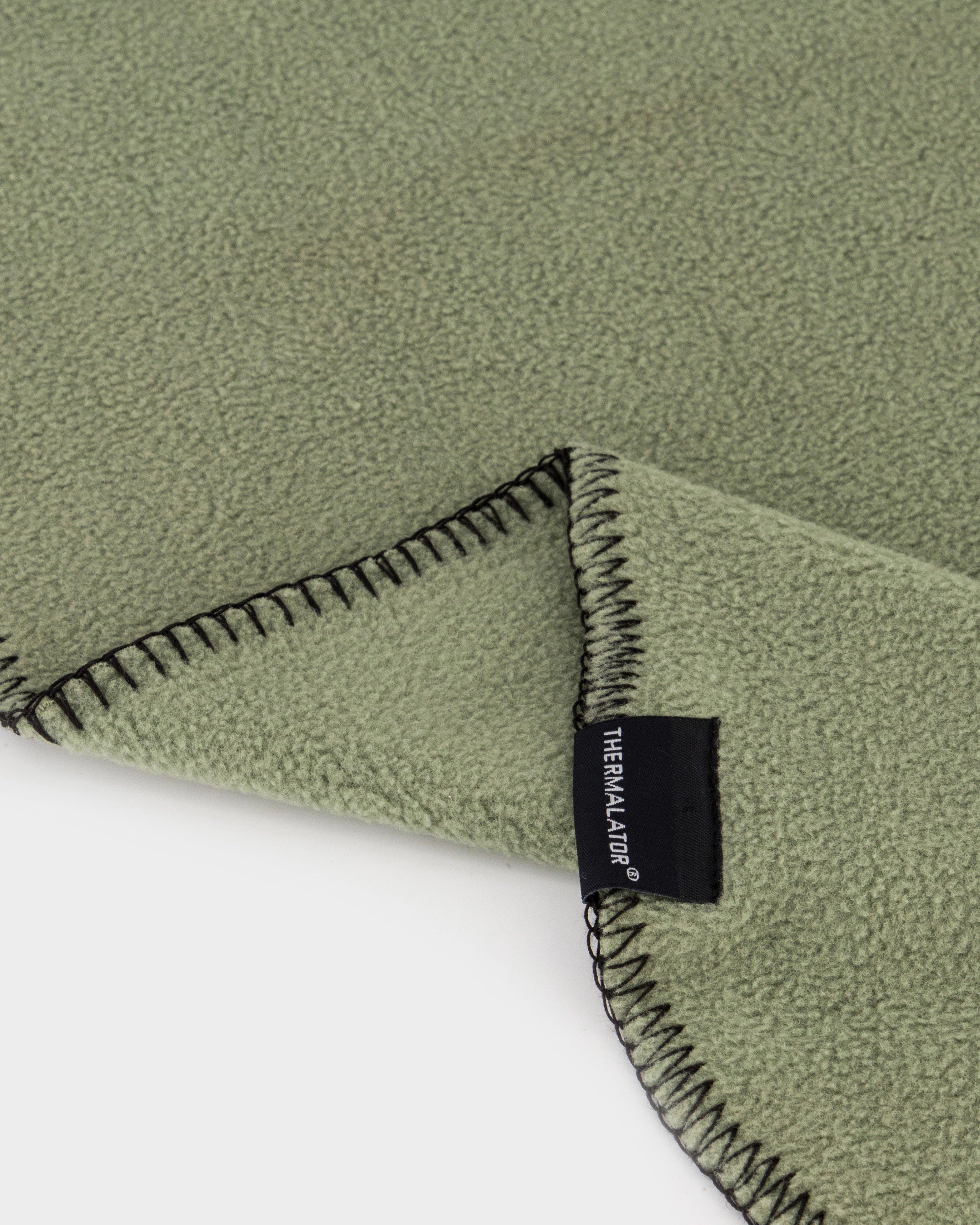 KWay Eco Fleece Blanket Cape Union Mart