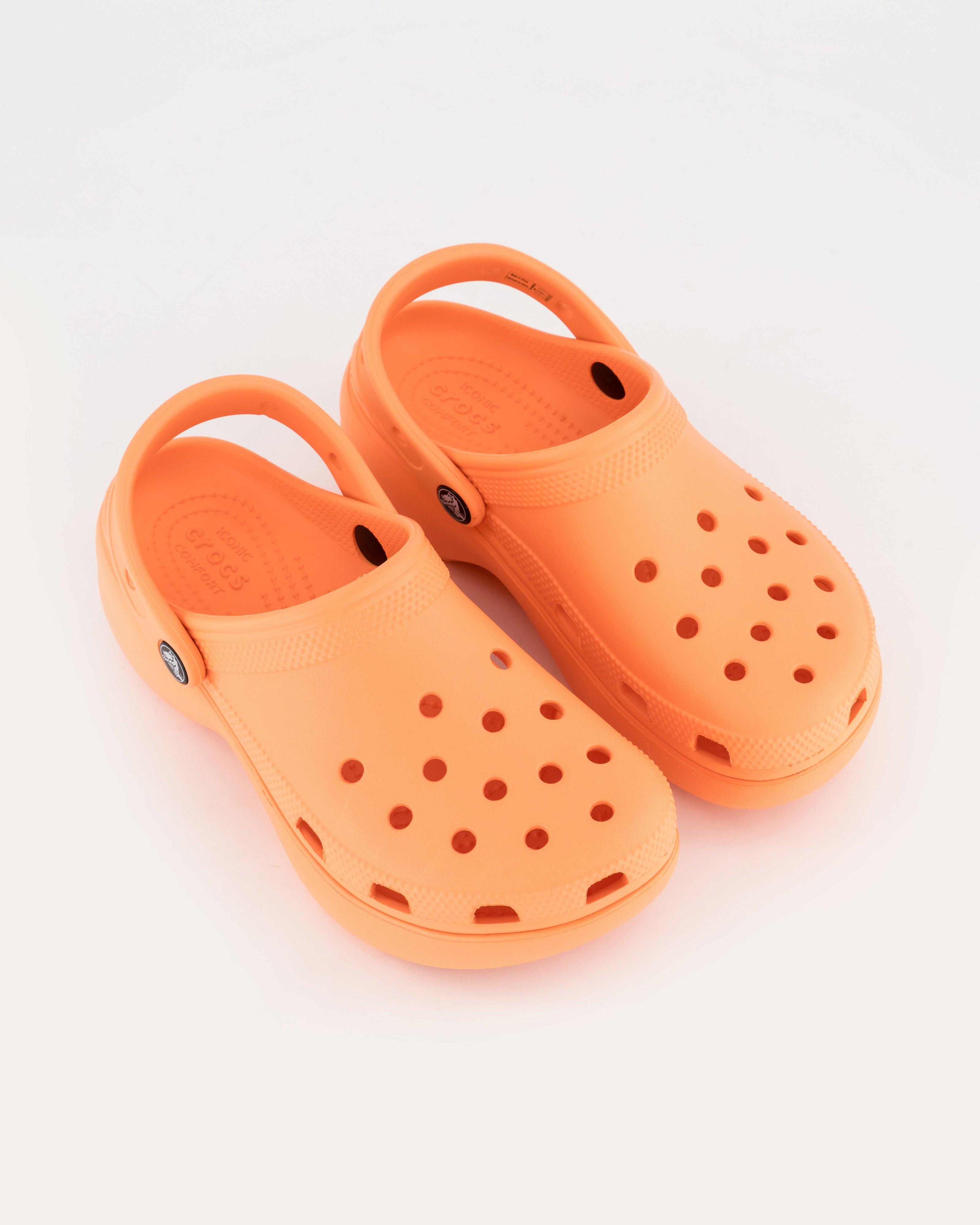 Peach crocs discount