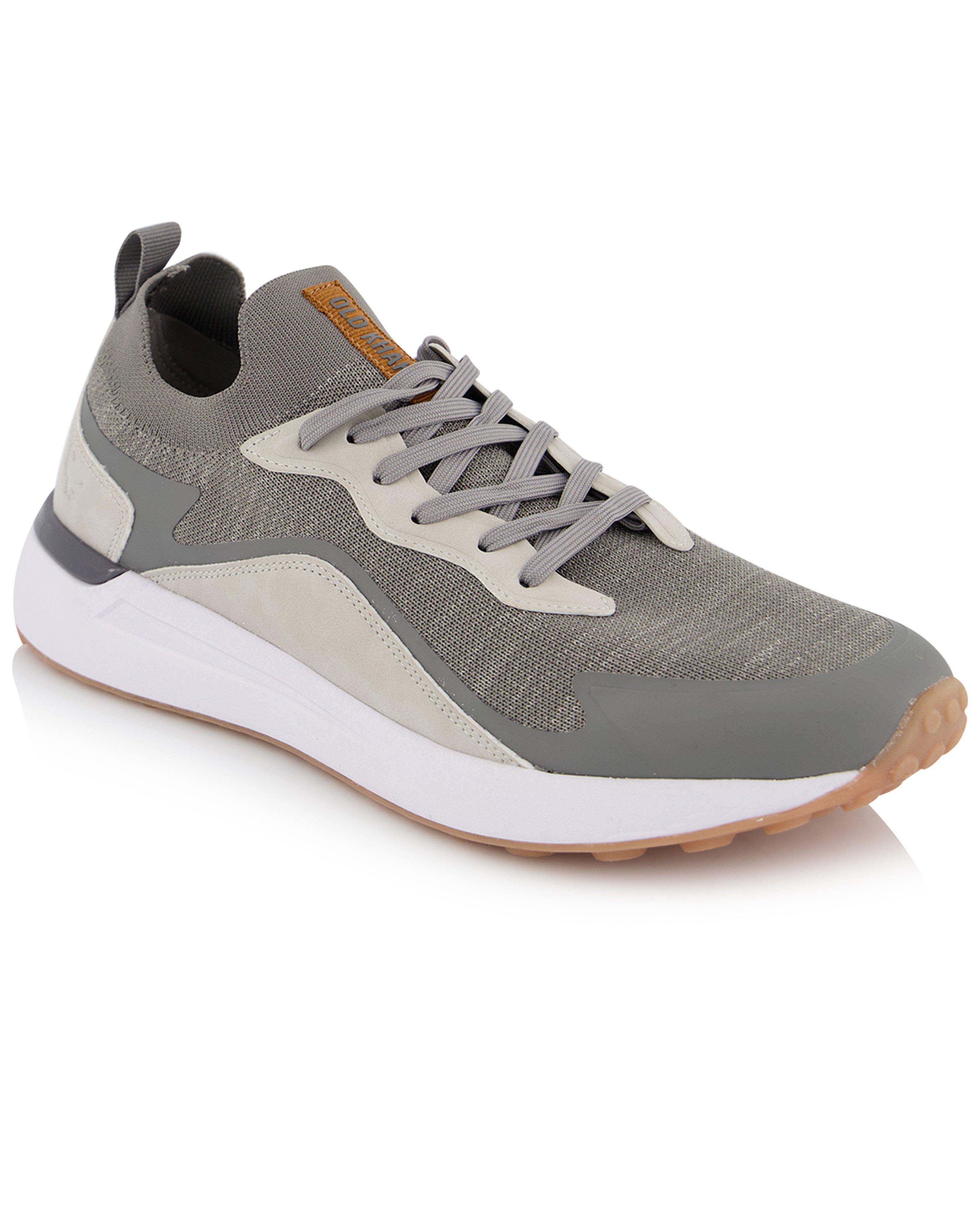 old khaki puma sneakers