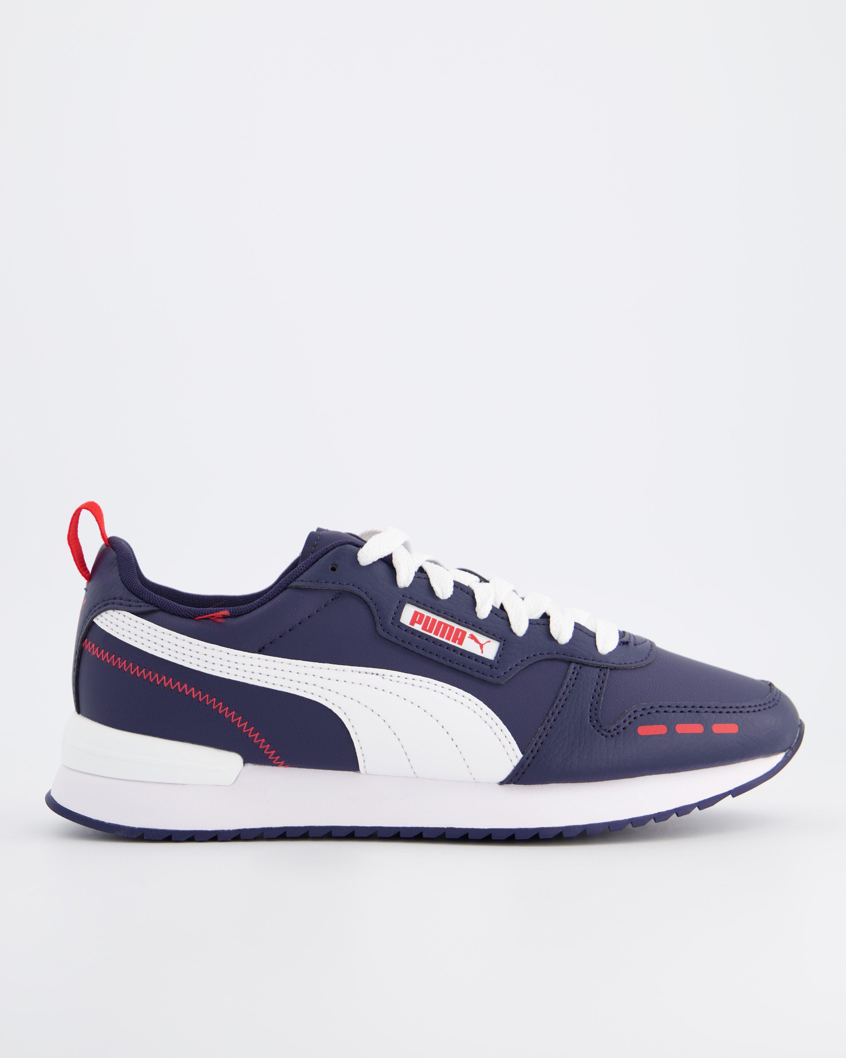 old khaki puma sneakers