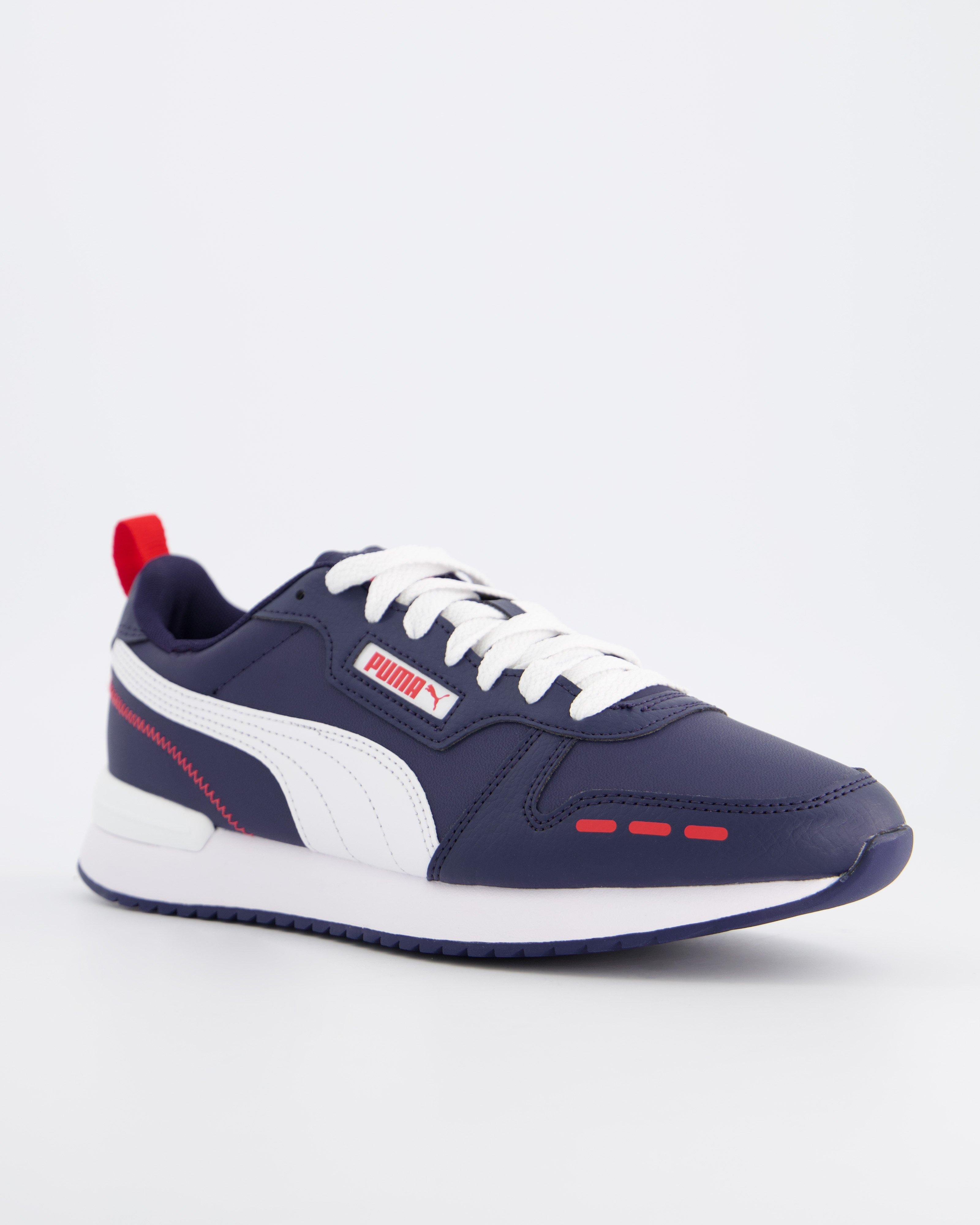 old khaki puma sneakers